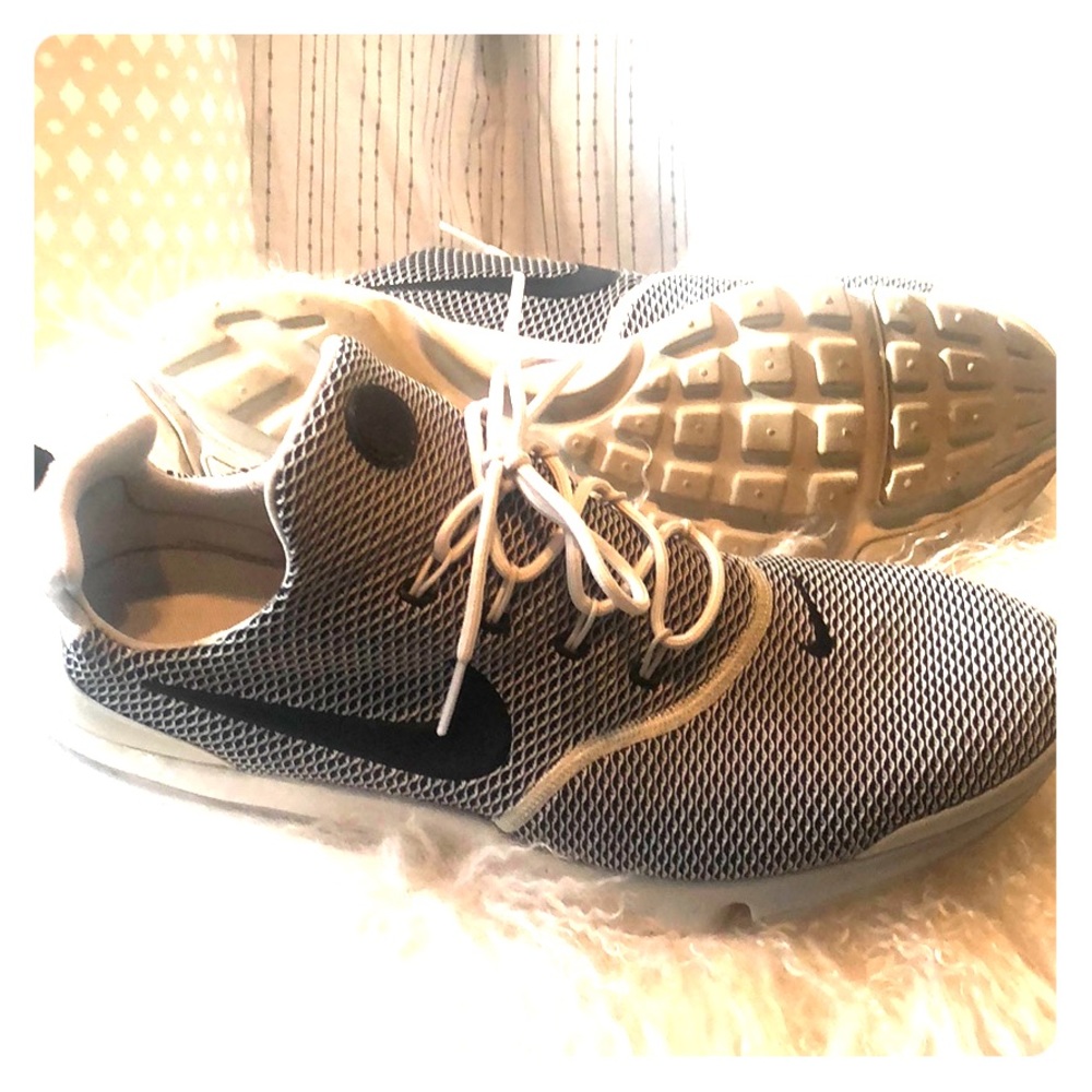 Men’s size12 Nike shoes.Cream and black tongueless